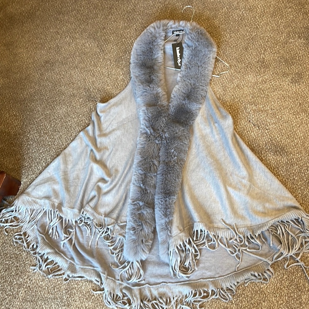 Women’s one size boutique vest. Kimberly.E brand. NEW